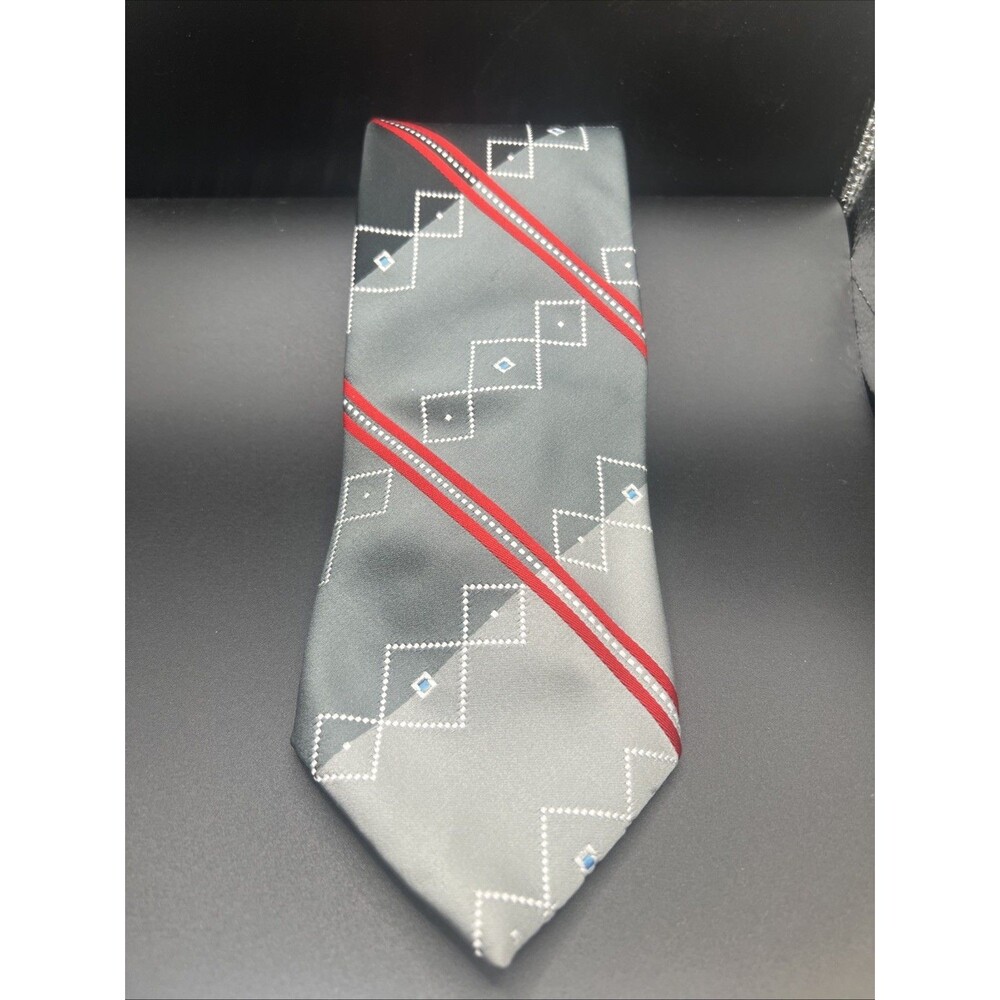 Wembley Geometric necktie. Woven. France. Gray, Black,Red, Blue